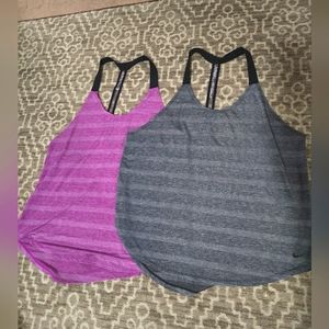 2 women's Nike tanks large